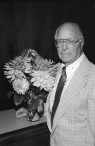 Rynearson and his flowers (circa 1972). [Image provided courtesy of the W. Bruce Fye Center for the History of Medicine and the Libraries History of Medicine Collection at Mayo Clinic, Rochester, Minn.]